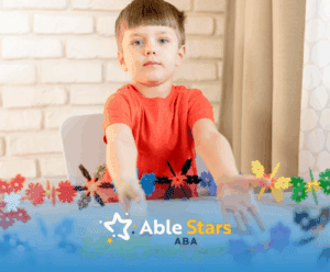 A child with autism playing with colorful toys on a table