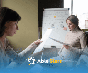 A pregnant lady looking at medical results with her OBGYN