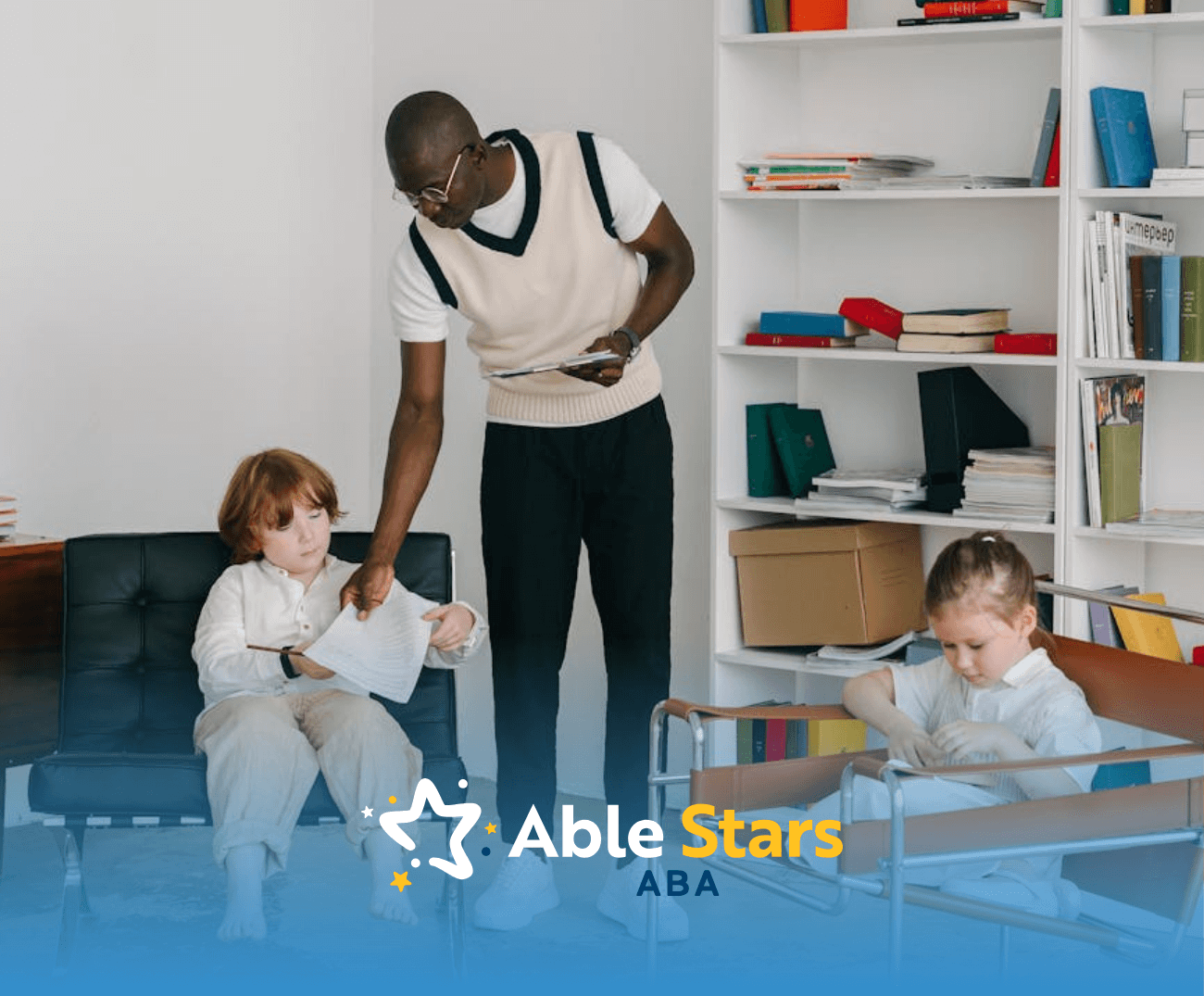 A behavior therapist handing worksheet to autistic child during an in-home ABA therapy session in Maryland.