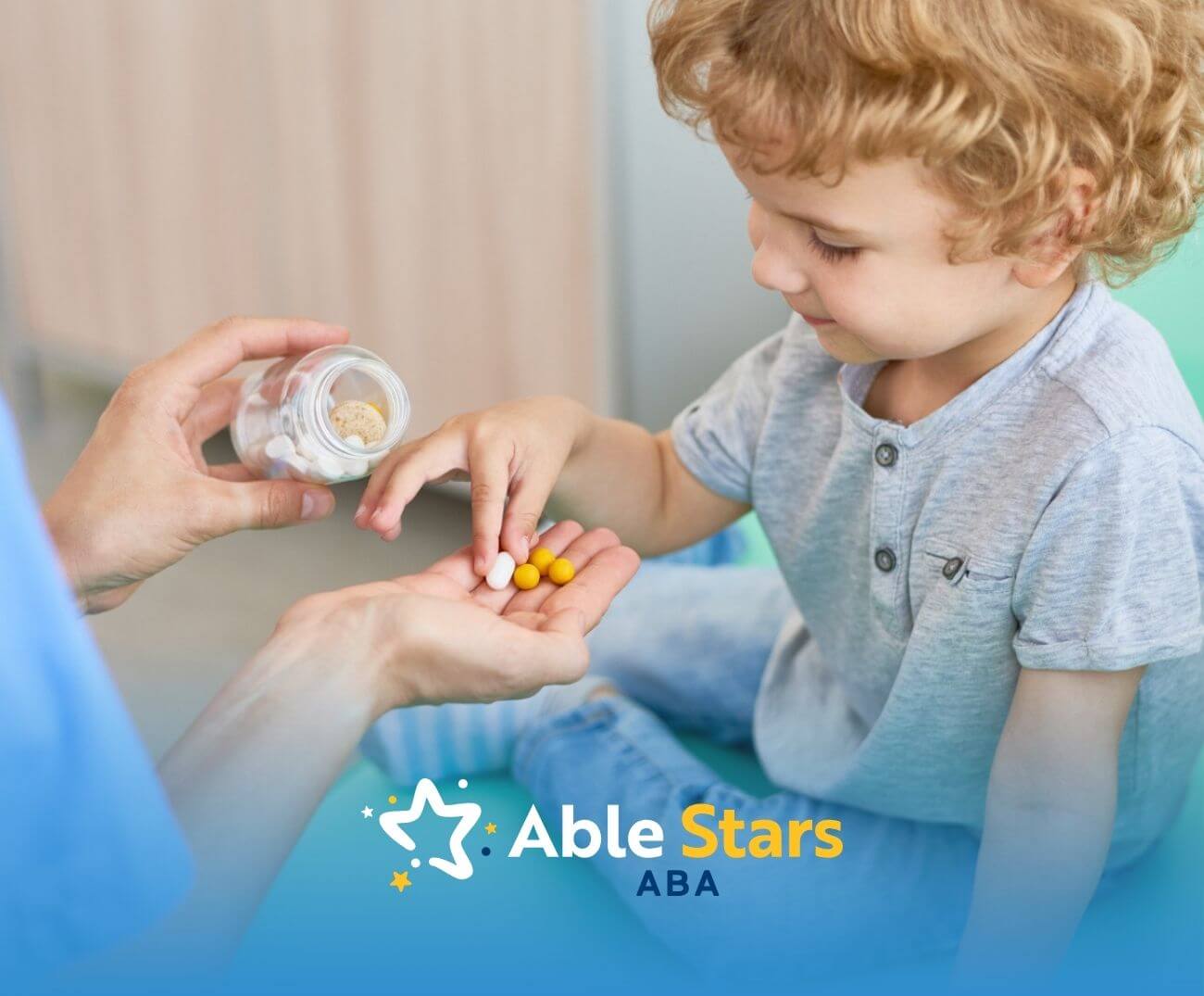 A child with autism reaching for medication for autism from an adult’s hand.