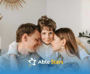 A smiling child embraces two adults with warmth and affection, set in a cozy room.