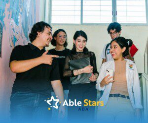 A group of five diverse young adults smiling and chatting while descending stairs. Bright atmosphere, casual attire, and a mural in the background.